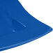 A close up of a Tablecraft cobalt blue cast aluminum platter with a curved edge.