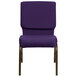 A Royal Purple Flash Furniture church chair with a gold vein metal frame.
