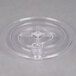 A clear plastic dish with a circular hole in it.