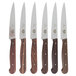 A row of Victorinox steak knives with rosewood handles.