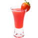 A strawberry placed on the rim of a Thunder Group plastic dessert shot glass.