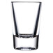 A clear Thunder Group plastic shot glass.