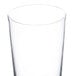 A clear plastic footed pilsner glass.