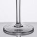 A close up of a Thunder Group plastic margarita glass with a thin stem.
