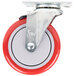 A red and white 5" swivel plate caster for Winholt cabinets.