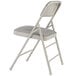 A National Public Seating gray metal folding chair with a gray cushion.