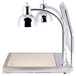 A silver Alto-Shaam heated dual lamp carving station on a metal stand.