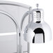 An Alto-Shaam heated dual lamp carving station with a chrome metal lamp and white shade.