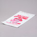 A white plastic bag with red text that reads "Cotton Candy" in large print.