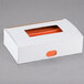 A white box of Bedford Industries Inc. orange paper bag ties.