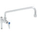 A chrome T&S add-on faucet with a long handle and blue accents.