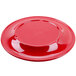 A red melamine plate with a wide rim.