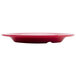 A red GET Red Sensation melamine plate with a wide rim.