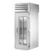 A True Spec Series stainless steel refrigerator with a glass door on the front.