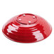 A red melamine bowl with white dots.