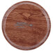 A Cambro Country Oak fiberglass tray with a circular surface.