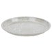 A gray Cambro round tray with abstract lines on it.