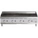 A Cooking Performance Group stainless steel gas countertop charbroiler with four lava briquette burners.
