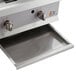 A Cooking Performance Group stainless steel gas countertop griddle with thermostatic controls.
