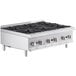 A Cooking Performance Group countertop gas range with six burners and knobs, made of stainless steel.