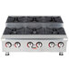 An APW Wyott stainless steel countertop gas range with six burners.