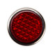 A red pilot light with a silver frame and diamond pattern on the button.