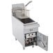 A Cooking Performance Group natural gas countertop fryer with a basket inside.