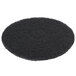 A black Scrubble by ACS stripping floor pad with a circular pattern.