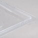 A clear Rubbermaid polycarbonate food storage box lid on a clear plastic container.