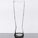 A Spiegelau tall Pilsner glass on a table.