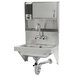 A stainless steel Advance Tabco wall mounted hand sink with a faucet.