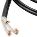 A close up of a black Nemco cord with copper wires.