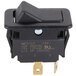 A black Nemco Euro style rocker switch with a black plastic cover.