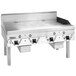 A large stainless steel Garland liquid propane griddle with thermostatic controls.