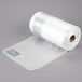 A roll of Inteplast Group clear plastic produce bags.