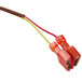 A red and yellow wire with a red and yellow connector attached to a Nemco Thermocouple.