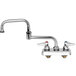 A chrome T&S deck-mounted workboard faucet with double jointed swing nozzle and two levers.
