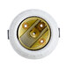 A white round Nemco lampholder socket with gold and silver screws.