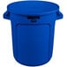 A blue Rubbermaid BRUTE trash can with handles and the word "brute" on it.
