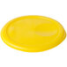 A yellow plastic lid with an oval shape.