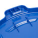 A blue Rubbermaid lid for a round trash can.