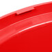 A red plastic dome lid for a Rubbermaid 44 gallon trash can.