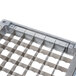 A metal grid with holes, the Nemco 55479 Blade Spacer.