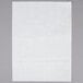 A Baker's Mark white parchment paper sheet on a gray surface.
