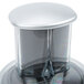 A close up of a clear glass and silver container with a lid.