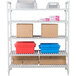 A white Cambro Camshelving® Premium shelving unit with 5 vented shelves holding boxes and containers.