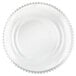 A white Charge It by Jay glass charger plate with a clear beaded rim.