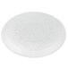 A white glass charger plate with a circular design.