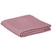 A folded pink Intedge table cover on a white background.