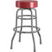 A Lancaster Table & Seating maroon vinyl double ring swivel bar stool with metal legs.